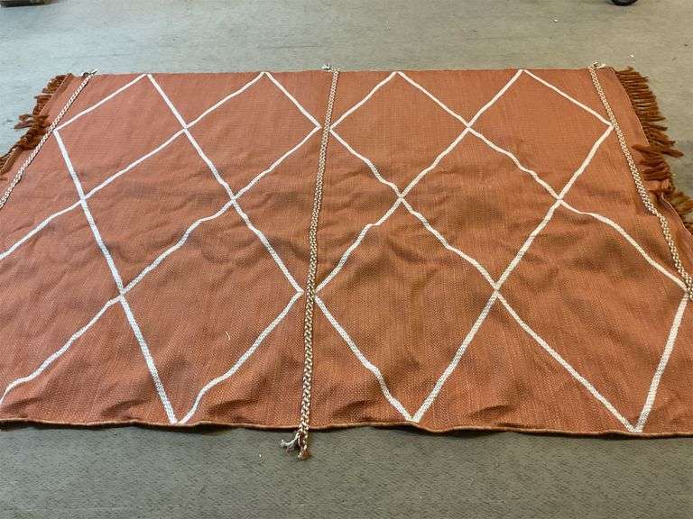 Large orange rug with fringe image