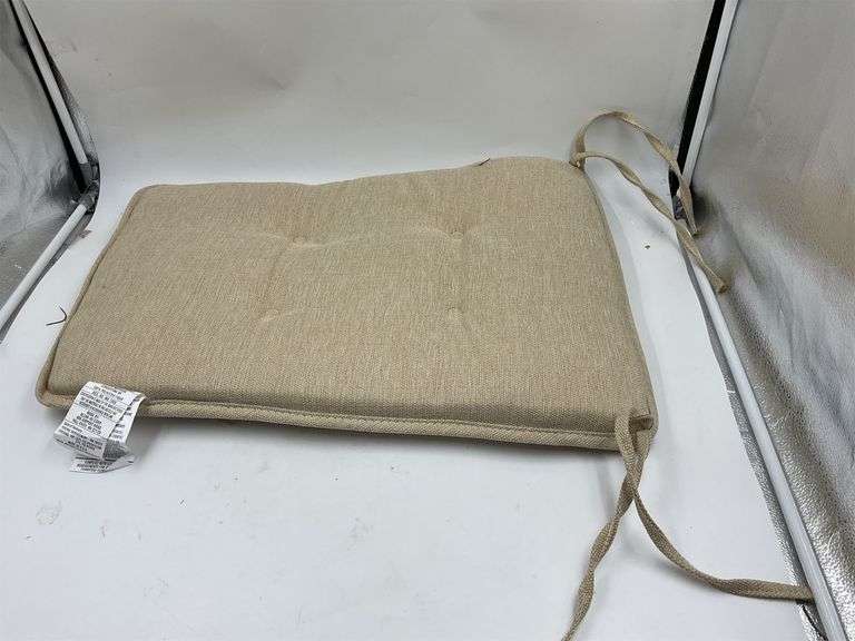 Beige outdoor chair cushion image