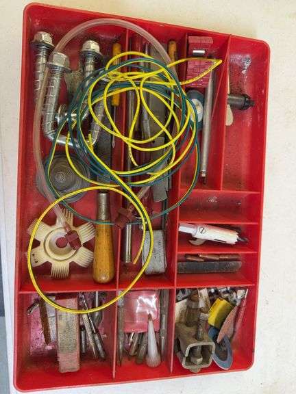 Variety of Tools and Hardware in Red Storage Case image