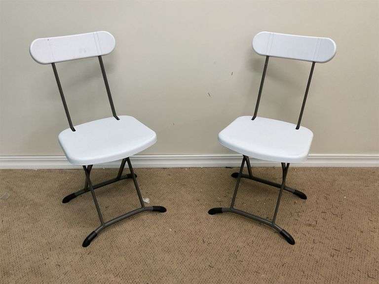 (2) foldable white chairs image