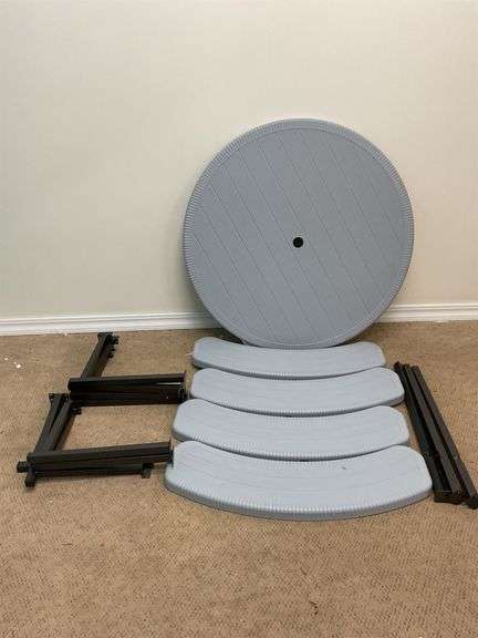 Light gray outdoor circular table image