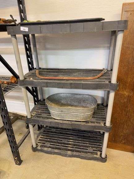 Shelving Unit with Tub, Metal Saw, Gloves, and Tray image