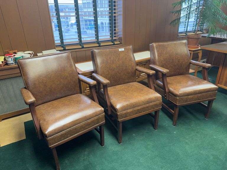 Set of Three Brown Vinyl Office Chairs with Armrests image