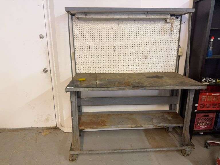 Rolling Metal Work Bench with Pegboard and Light, 61x31x74, turns on image