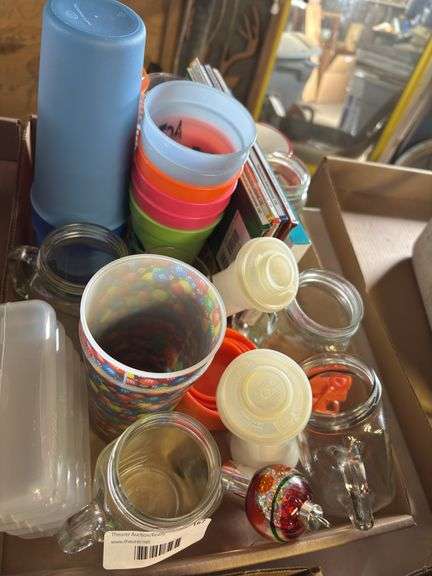 Mixed Lot: Plastic Cups, Mason Jars, Books, and Christmas Ornament image