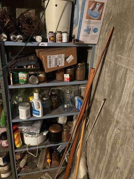 Shelving Unit with Various Items image
