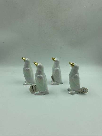 Set of Four Ceramic Penguin Figurines image