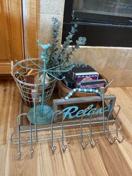 Assorted Decorative Items: Jewelry Holder, DVDs, "Relax" Sign, and More image
