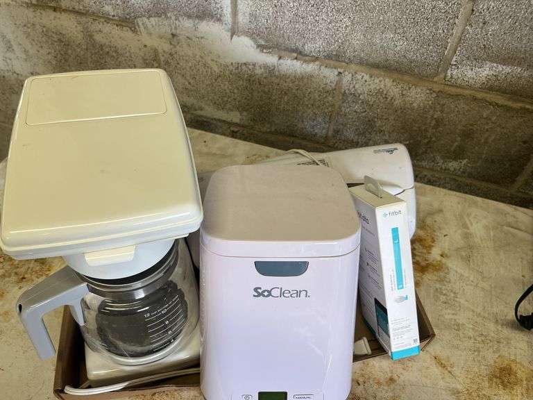 Assorted Kitchen and Health Items - Coffee Maker, SoClean, Rival Seal-a-Meal, Fitbit image