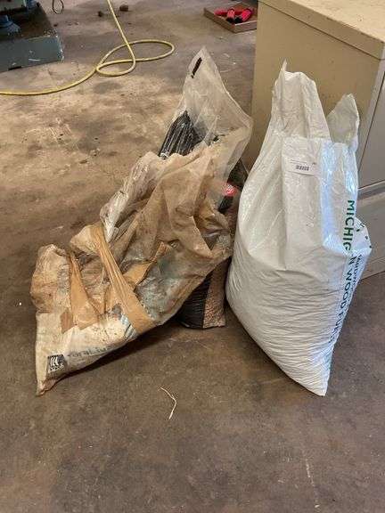 Mixed Lot of BBQ Pellets, Animal Feed, and Wood Fuel Pellets image