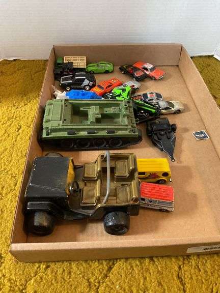 Large Assortment of Diecast Vehicles and Toys image