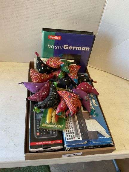 Box Lot: Calculators, Language Book, and Sewing Items image
