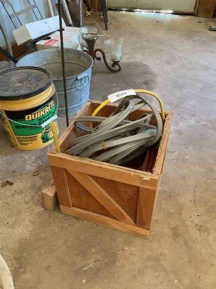Wooden Crate with Extension Cord and Air Hose image