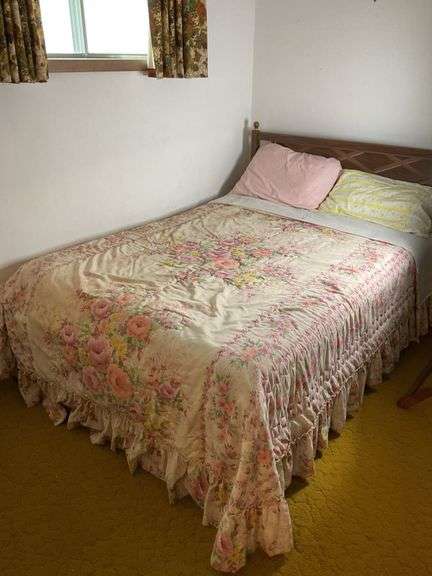 Full Size Bed with Floral Quilt image