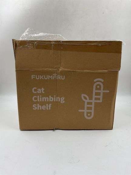 Cat climbing shelves image