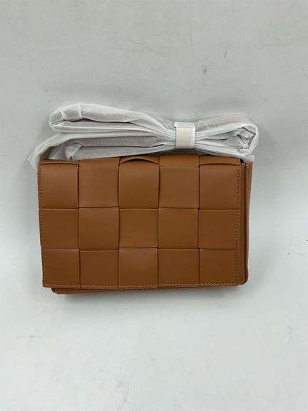 Brown leather purse image