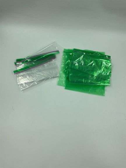 Lot of Clear and Green Plastic Zip Top Bags image
