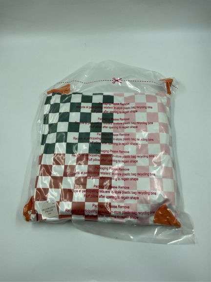 Decorative Checkered Pillow with Orange Accents image