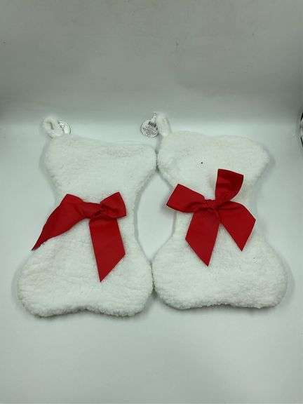 Pair of White Plush Christmas Stockings with Red Bows image