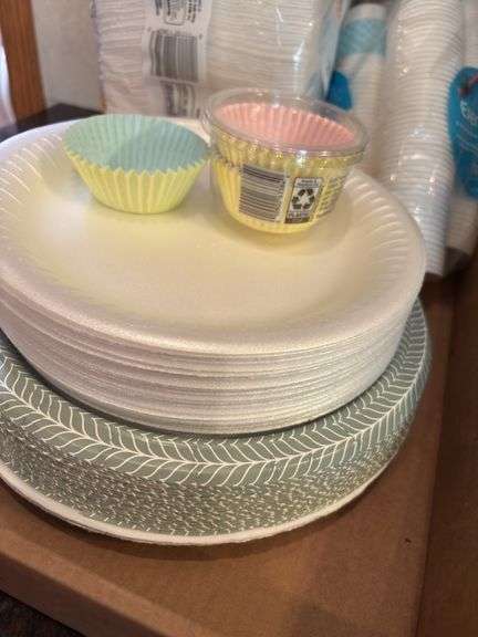 Assorted Party Supplies: Paper Plates, Napkins, Cups, and Cupcake Liners