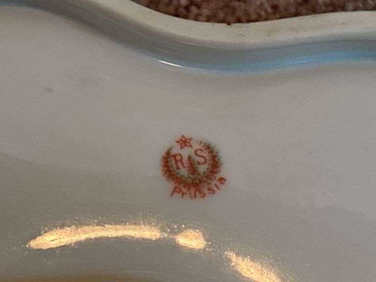 Decorative Gravy Boats and Floral Plates