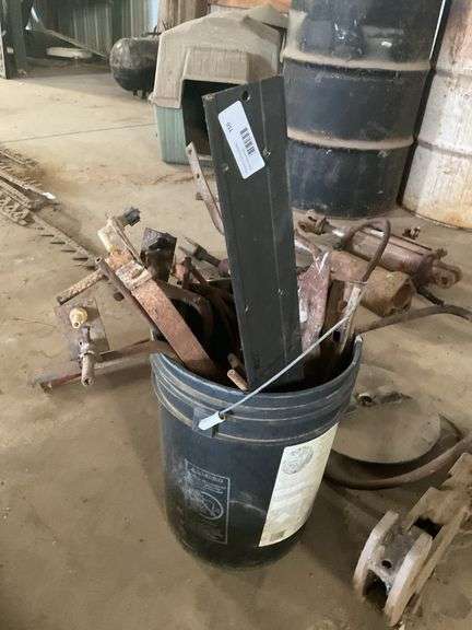Bucket of Farm Equipment Parts image