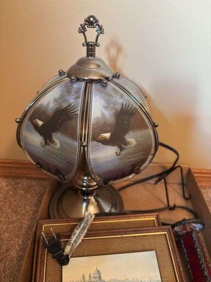 Assorted Decoratives: Eagle Lamp, Framed Print, and Artificial Plants