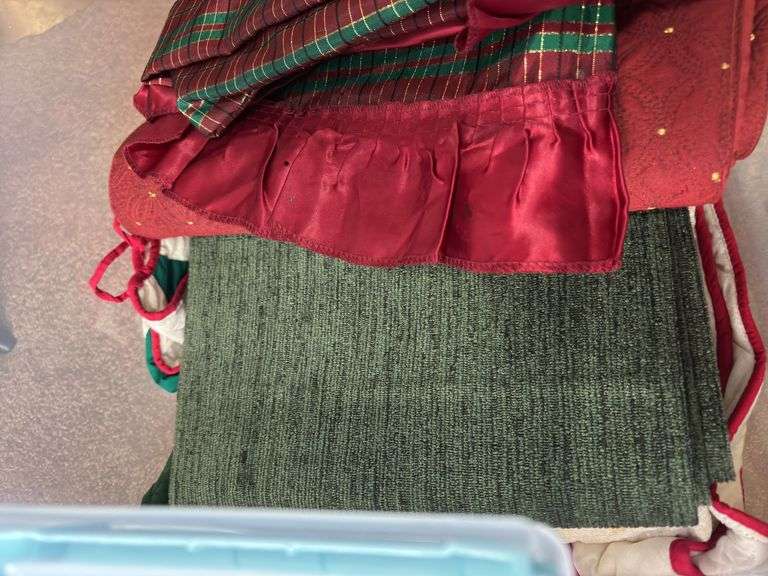 Variety of Fabric and Textile Pieces in Container