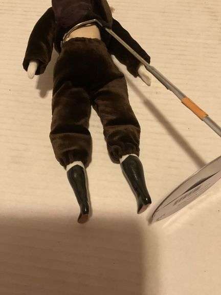 Porcelain Doll in Brown Outfit