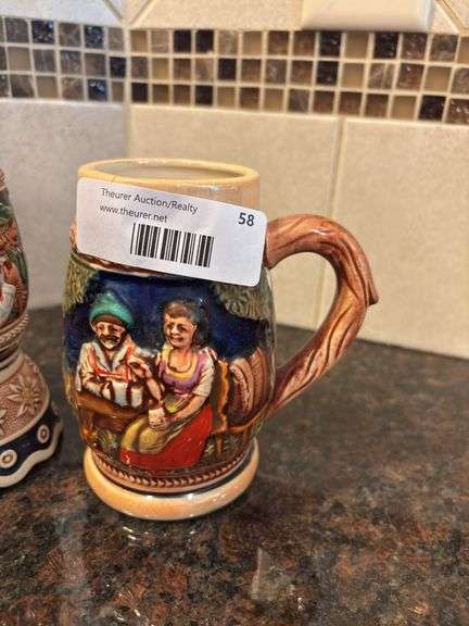 Two Hand-Painted Beer Steins