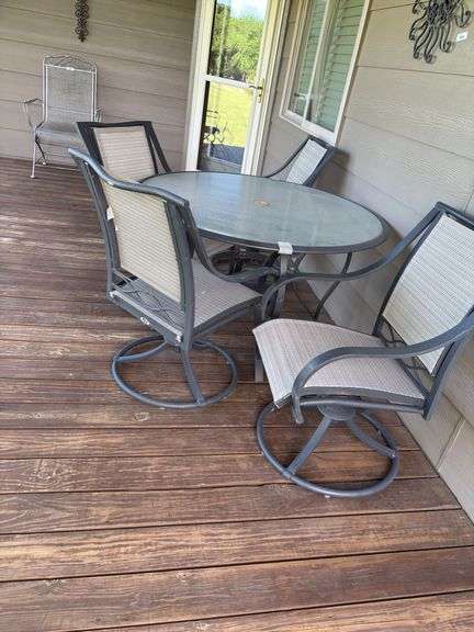 Outdoor Patio Table with Four Swivel Chairs