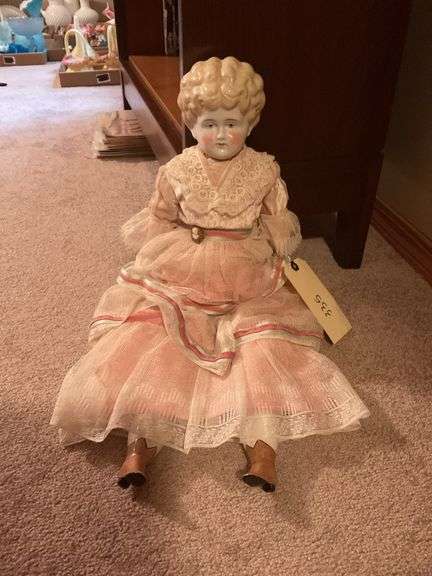 Collectible Porcelain Doll with Pink Dress