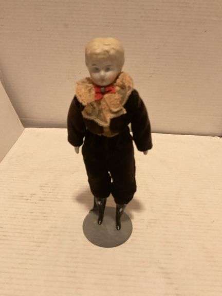 Porcelain Doll in Brown Outfit