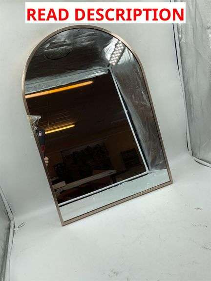 Arched mirror with metal rim image