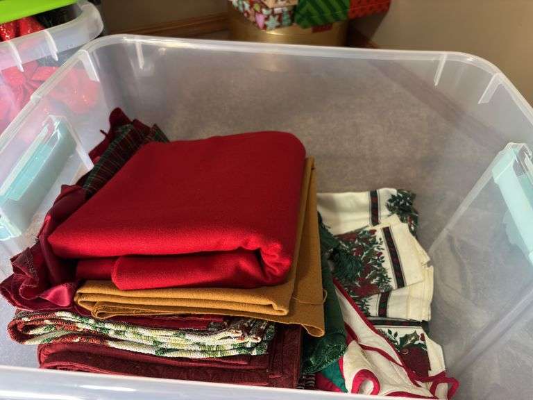 Variety of Fabric and Textile Pieces in Container