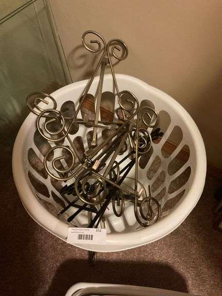 Assorted Household Items: Glass, Baskets, and Picture Hangers