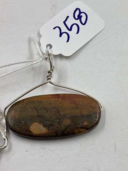 Two Stone Pendants with Silver Mountings