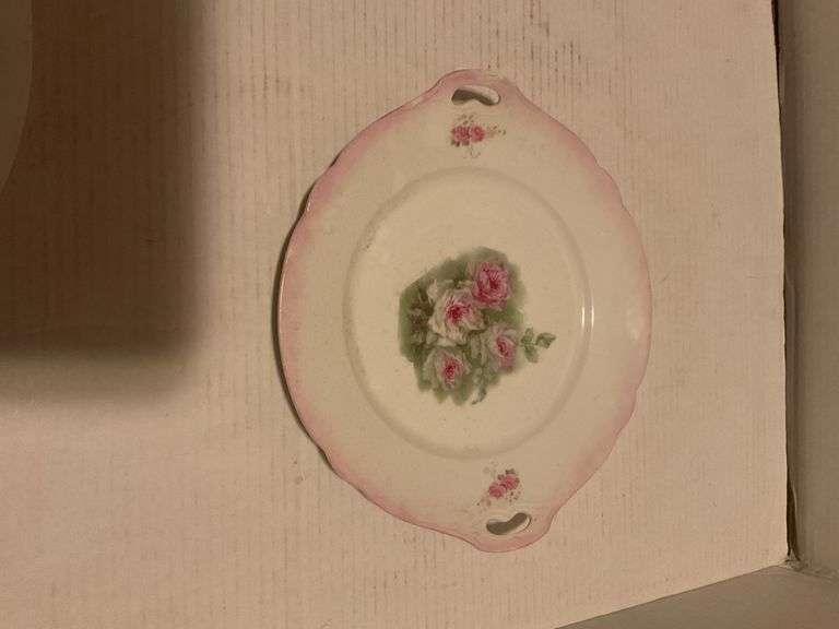 Collection of Decorative Plates and Bell