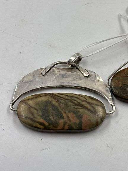 Two Stone Pendants with Silver Mountings