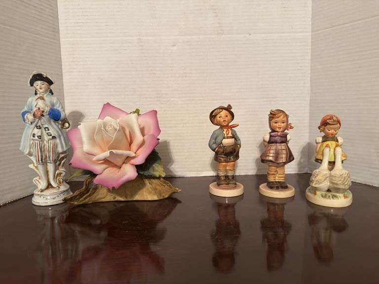 Collection of Goebel Hummel Figurines and Floral Decoration