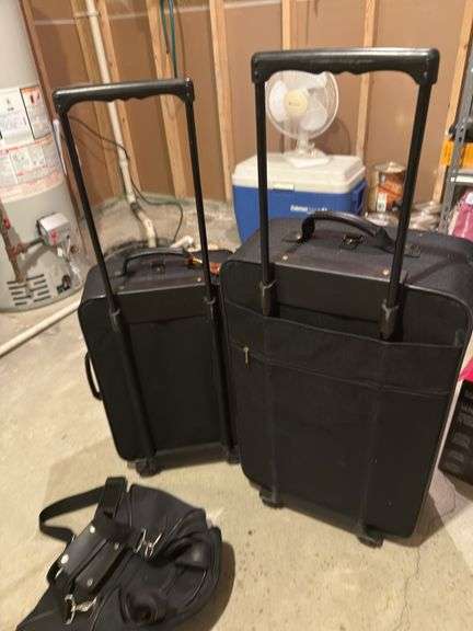 Two Rolling Lucas Suitcases with Additional Bag