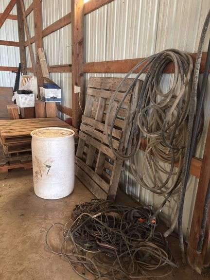 Pallets, Hoses, Barrels, Lumber & More along west wall image