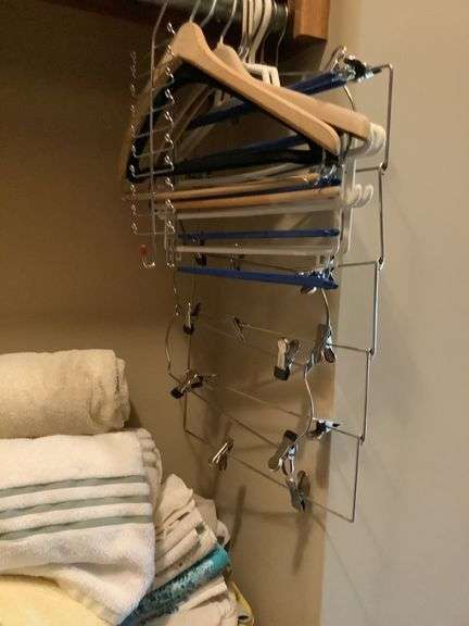Mixed Lot of Household Linens, Hangers, and Paper Products