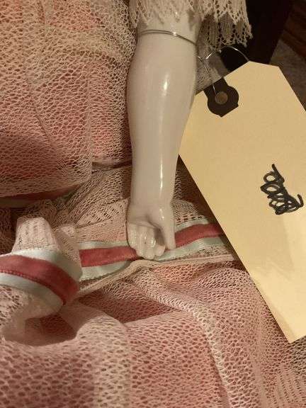 Collectible Porcelain Doll with Pink Dress