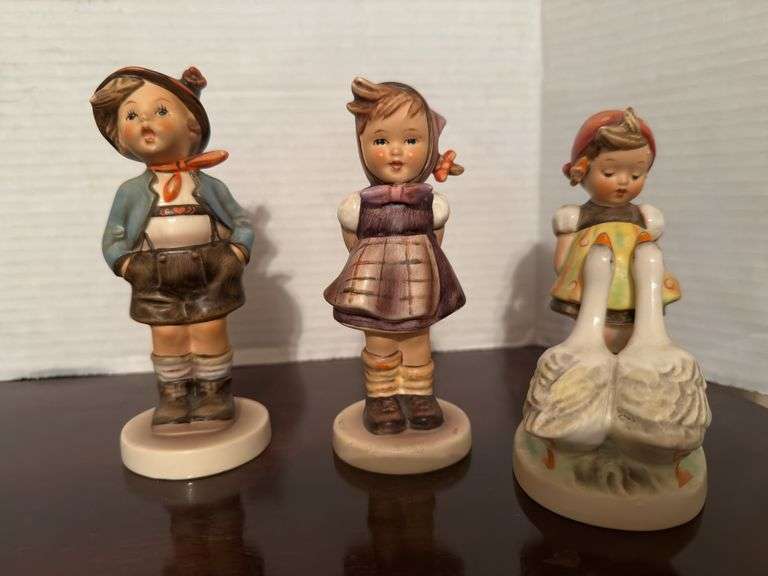 Collection of Goebel Hummel Figurines and Floral Decoration