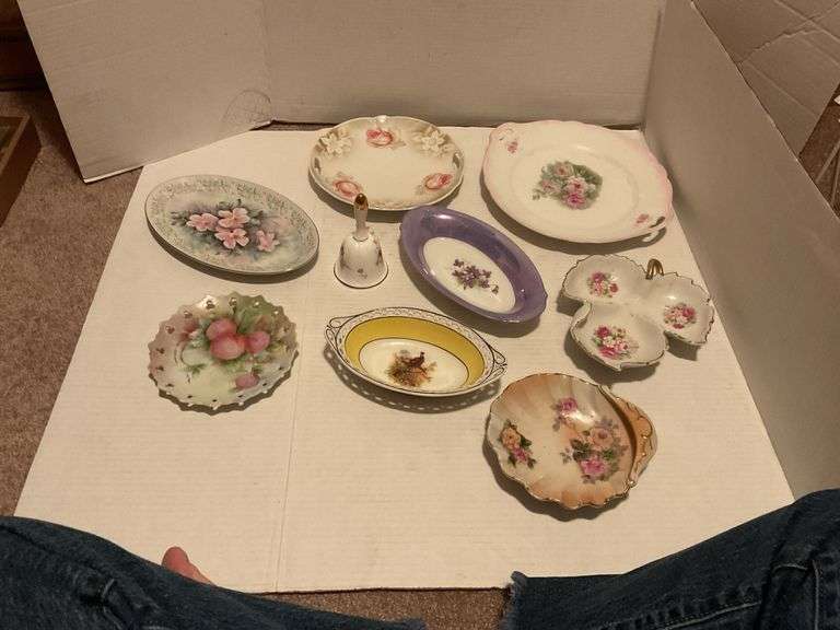Collection of Decorative Plates and Bell