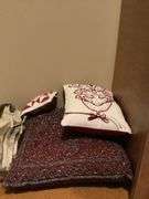Assorted Decorative Pillows and Bedding