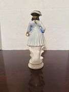 Collection of Goebel Hummel Figurines and Floral Decoration