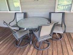 Outdoor Patio Table with Four Swivel Chairs