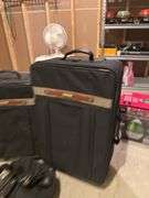 Two Rolling Lucas Suitcases with Additional Bag